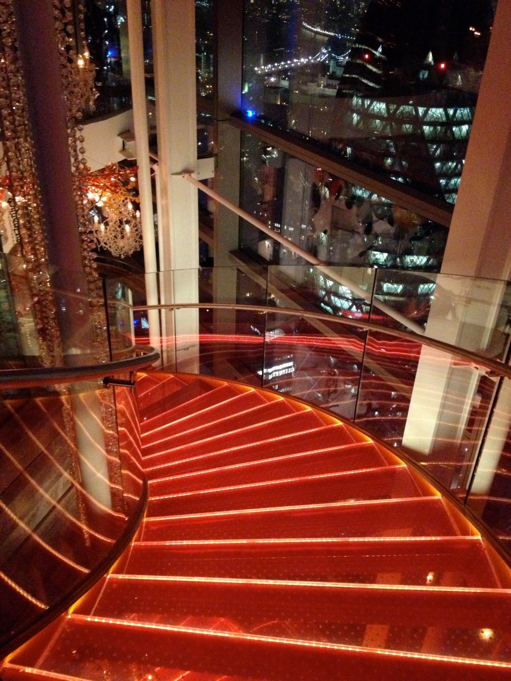 The staircase in the bar - check out the gherkin outside