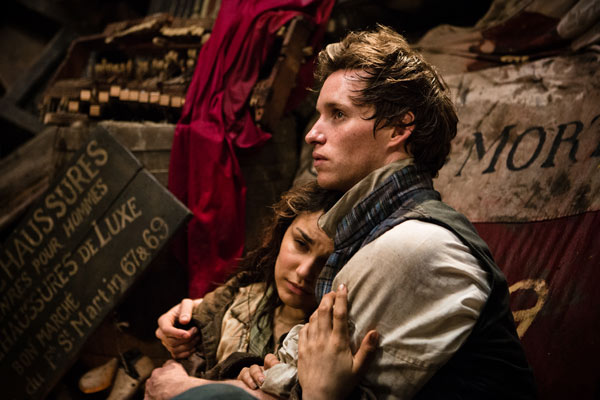 Eddie Redmayne and Samantha Barks as Marius and Éponine