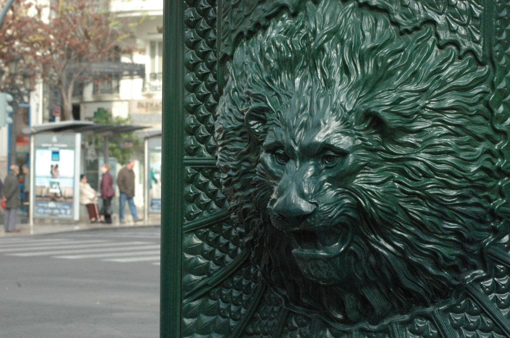 Lion detailing on an advertising post