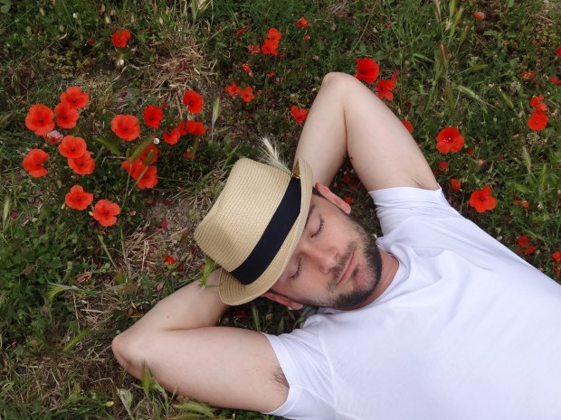 Dominik takes a rest amongst the poppies, Oz style.