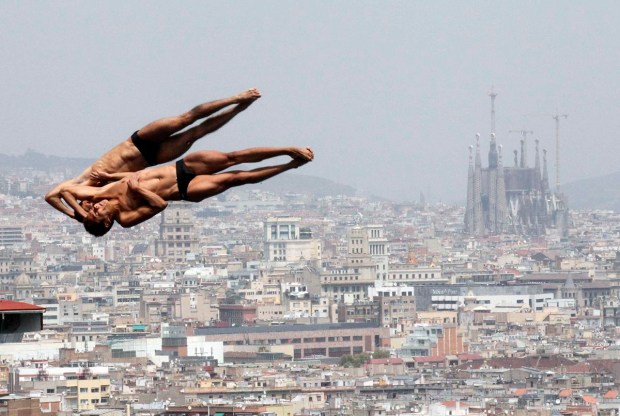 Mexico's Garcia and Sanchez perform dive during practice for men's synchronised 10m platform event in Barcelona